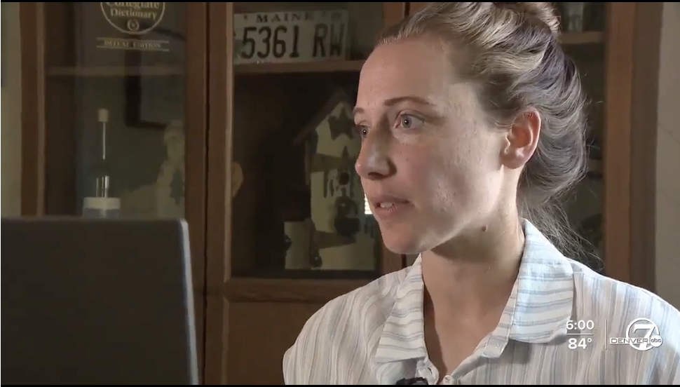 Meg Moore being interviewed.